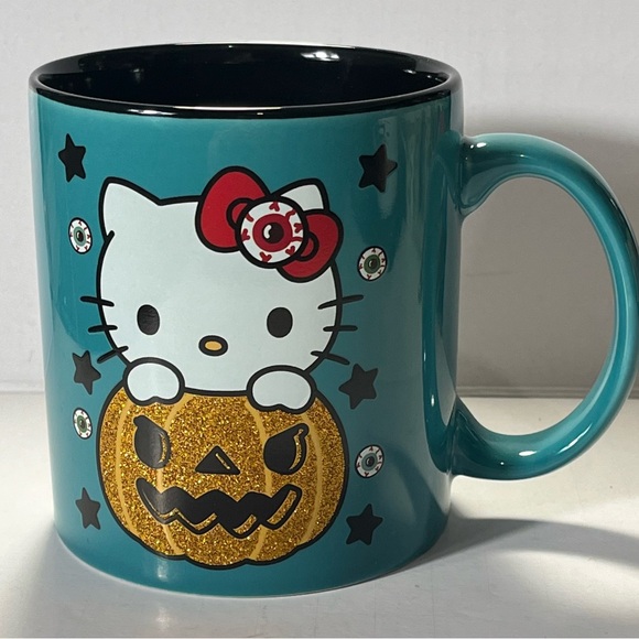 Hello Kitty 20oz Teal Green Halloween Mug - Jack O Lantern Stars Eyeballs - Picture 1 of 5